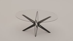 Round glass table with a geometric star-shaped metal base on a light background.