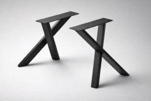 Two small black tables with crisscrossed legs and rectangular tops on a light gray background.