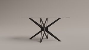 Metal table base with crossed X-shaped legs on a light neutral background.