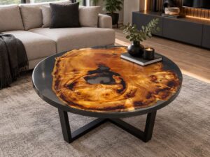 Handcrafted round wooden coffee table with a rich natural grain in a modern living room, highlighting our wooden tables and doors.